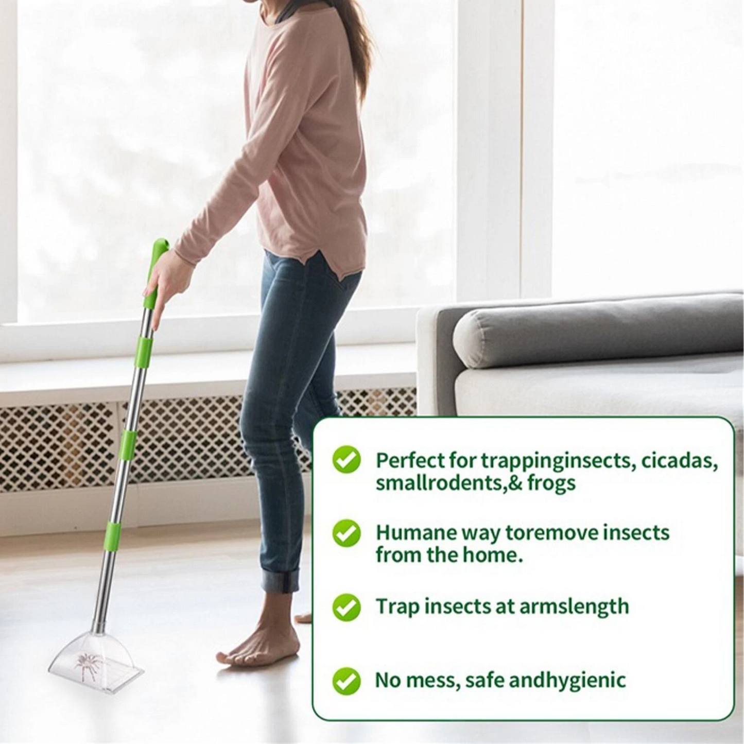 Woman using long handle bug catcher to trap insect on floor